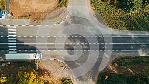 Aerial top view of the new road, road marking. Car