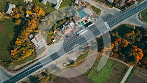 Aerial top view of the new road, road marking. Village, field