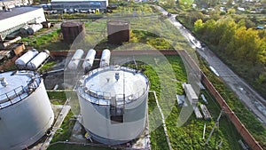 Aerial top view oil storage tanks. Stock. Top view of the large oil tanks