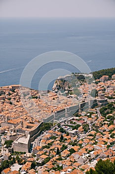 Aerial top view on the old city of Dubrovnik, from the observation deck on the mountain above the city. Film location