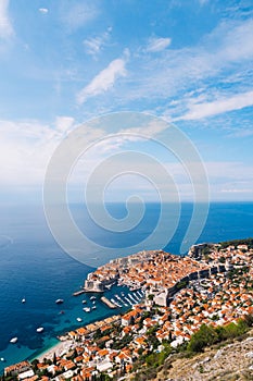 Aerial top view on the old city of Dubrovnik, from the observation deck on the mountain above the city. Film location