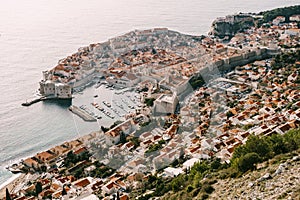 Aerial top view on the old city of Dubrovnik, from the observation deck on the mountain above the city. Film location