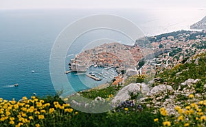 Aerial top view on the old city of Dubrovnik, from the observation deck on the mountain above the city. Film location