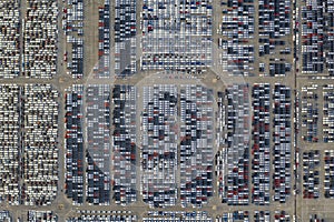 Aerial top view of the open space carpark with lots of car photo
