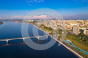 Aerial top view panorama city Perm and central embankment of Kama river Russia, sunset drone photo