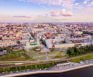 Aerial top view panorama city Perm and central embankment of Kama river Russia, sunset drone photo