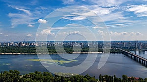 Aerial top view of Paton bridge and Dnieper river from above, city of Kiev, Kyiv cityscape skyline, Ukraine