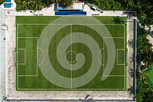 Aerial top view play-field. Empty soccer stadium green field from drone. Football field from above