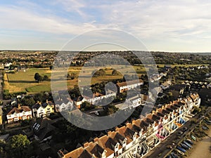 Aerial top view  at pretty terrace Houses in Whitstable, Kent, Uk, England, UK. Evening sunset light on the properties Wave Crest