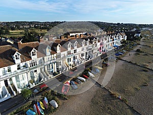 Aerial top view  at pretty terrace Houses in Whitstable, Kent, Uk, England, UK. Evening sunset light on the properties Wave Crest