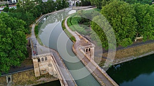 Aerial top view of river, canal du Midi and bridges from above, Beziers town in South France