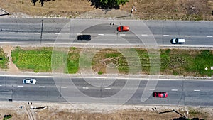 Aerial top view of road from above, automobile traffic of many cars, transportation