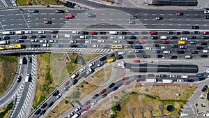 Aerial top view of road junction from above, automobile traffic and jam of cars, transportation concept