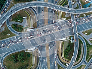 Aerial top view of road junction in Moscow from above, automobile traffic and jam of many cars, transportation concept