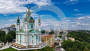 Aerial top view of Saint Andrew`s church and Andreevska street from above, cityscape of Kiev Kyiv, Ukrai photo