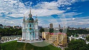 Aerial top view of Saint Andrew`s church and Andreevska street from above, Podol, city of Kiev Kyiv, Ukraine