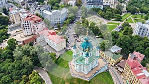 Aerial top view of Saint Andrew`s church and Andreevska street from above, Podol, city of Kiev Kyiv, Ukraine