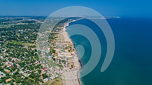 Aerial top view of sandy beach of Mediterranean sea from above, vacation and holiday resort