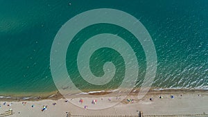 Aerial top view of sandy beach of Mediterranean sea from above, vacation and holiday resort