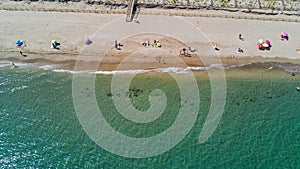 Aerial top view of sandy beach of Mediterranean sea from above, vacation and holiday resort