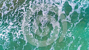 Aerial top view of Sea waves. Splashing ocean water