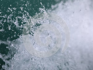 Aerial top view of sky Double bokeh sponge and tsunami is blowing to the shore.Use for website banner background,backdrop