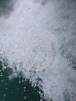 Aerial top view of sky Double bokeh sponge and tsunami is blowing to the shore.Use for website banner background,backdrop