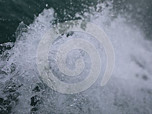 Aerial top view of sky Double bokeh sponge and tsunami is blowing to the shore.Use for website banner background,backdrop