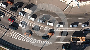 Aerial top view of stucked cars in a traffic jam.