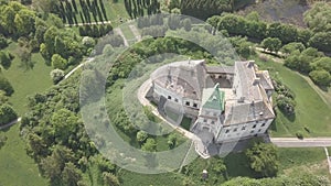 Aerial top view to historic castle and park in Olesko - famous ukrainian sightseeing