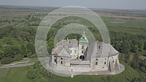 Aerial top view to historic castle and park in Olesko - famous ukrainian sightseeing