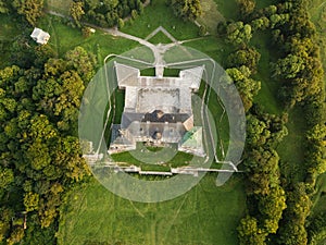 Aerial top view to palace castle in Pidhirci