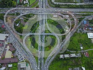 Aerial top view of Toll expressway, Motorway shaped like a triangle or heart, Modern transportation, Multilevel junction highway,