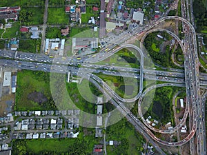 Aerial top view of Toll expressway, Motorway shaped like a triangle or heart, Modern transportation, Multilevel junction highway,