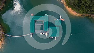 Aerial top view of water chalet resort in Kenyir Lake, Terengganu, Malaysia