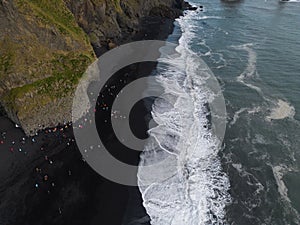 Aerial top view of wave of Black Sand Beach Reynisfjara in Iceland
