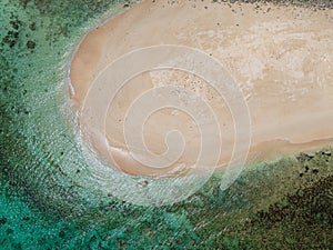 Aerial top view of waves going to Naked Island.