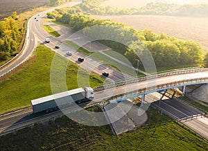 Aerial Top View of White Truck with Cargo Semi Trailer Moving on