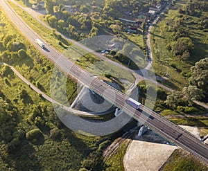 Aerial Top View of White Truck with Cargo Semi Trailer Moving on Road in Direction