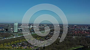 Aerial top view of Zwolle, surrounded by houses, green trees and canal