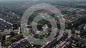 Aerial top view of Zwolle, surrounded by houses, green trees and canal