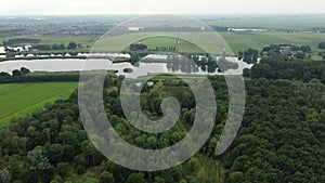 Aerial top view of Zwolle, surrounded by houses, green trees and canal