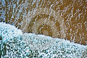 Aerial topshot from ocean waves