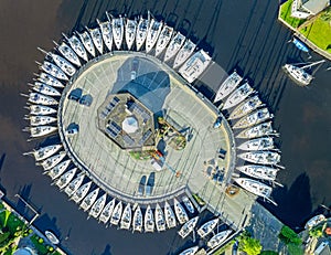 Aerial topshot from sailing yachts in the harbor in Lemmer Friesland the Netherlands photo