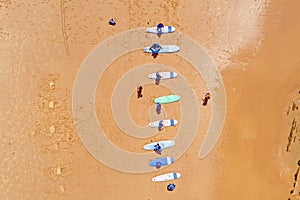 Aerial topshot from surferstraining on the beach