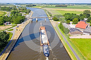 Aerial from towboat and pusher from freight on Princes Margriet canal in Friesland the Netherlands photo