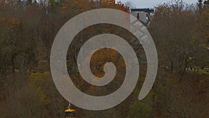 Aerial Tram Approaching the Station in Late Autumn in Sigulda.