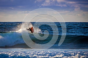 Aerial trick of a bodyboarder