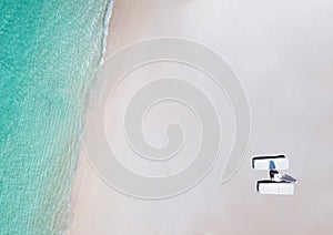 Aerial tropical white sand beach background with turquoise blue water and sun bead