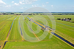 Aerial from two of four windmills of the Viermolengang near Aarlanderveen in the Netherlands